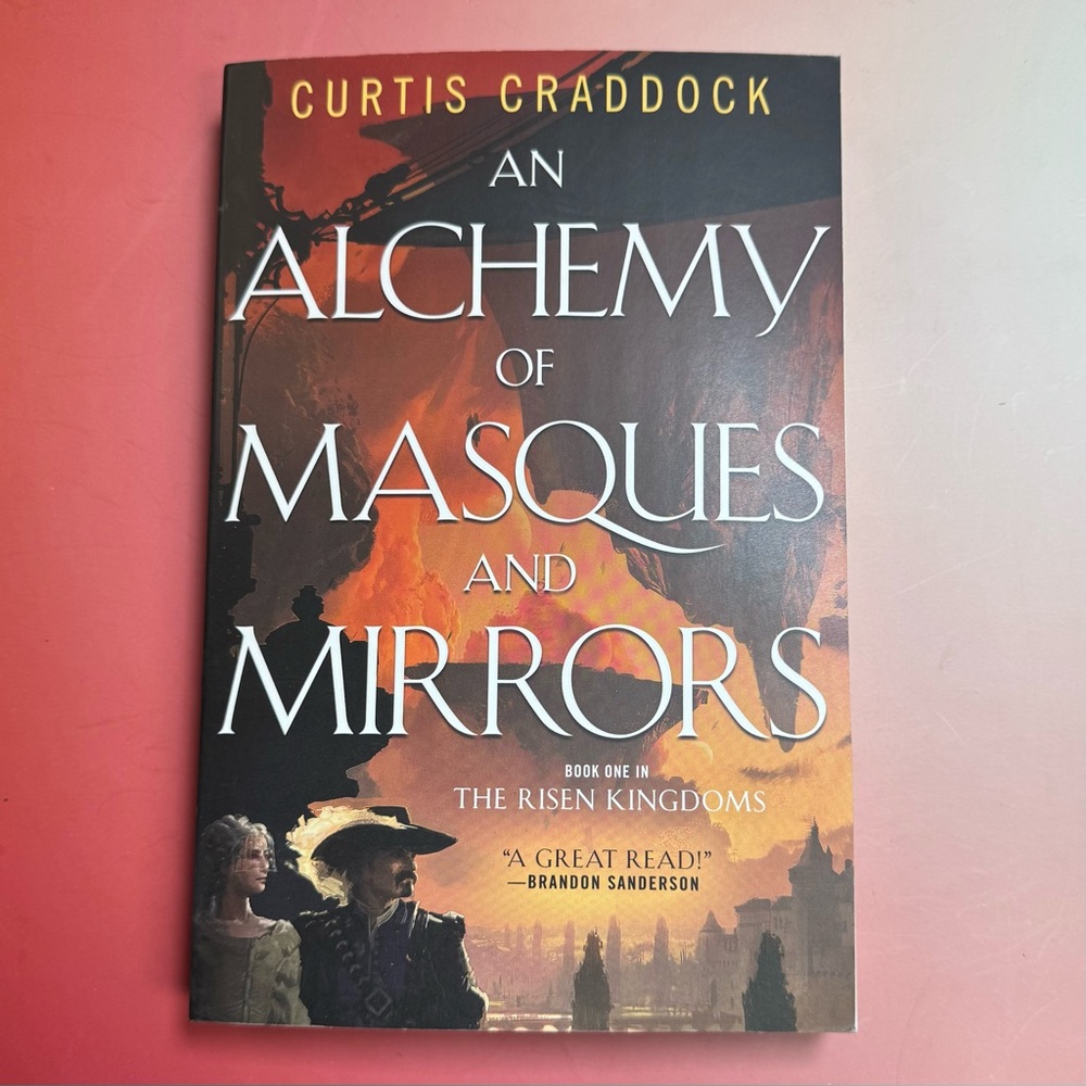 An Alchemy of Masques and Mirrors" by Curtis Craddock, which is Book One